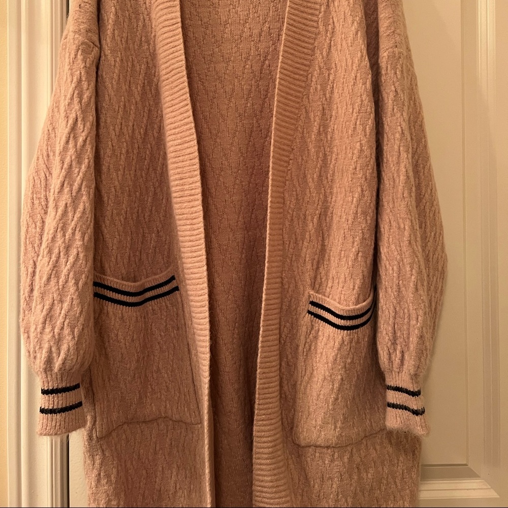 Nice cardigan. Brand new.